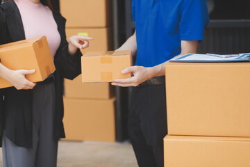 Truck Mover Unloading Van Carrying Boxes And Moving House