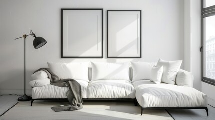 A white couch with a black lamp next to it