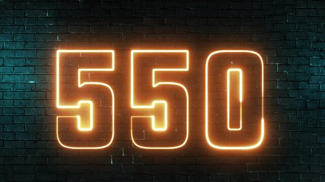 550 Electric orange lighting text with black background. 550 Number. Five hundred fifty neon sign.