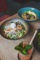 A vibrant collection of coffee, lemonades, ready meals, bistro photography, and desserts. Enjoy gourmet drinks, plated dishes, and sweet treats, perfect for showcasing culinary artistry and café ambia