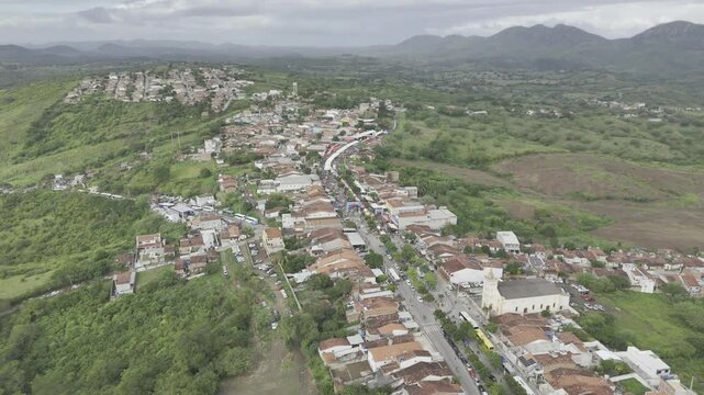 Drone flies to the right high over Galante