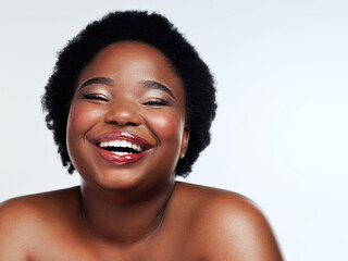 Portrait, funny and black woman with cosmetics, dermatology and luxury on white studio background. African person, face or model with beauty, makeup and wellness with shine, self care or skincare