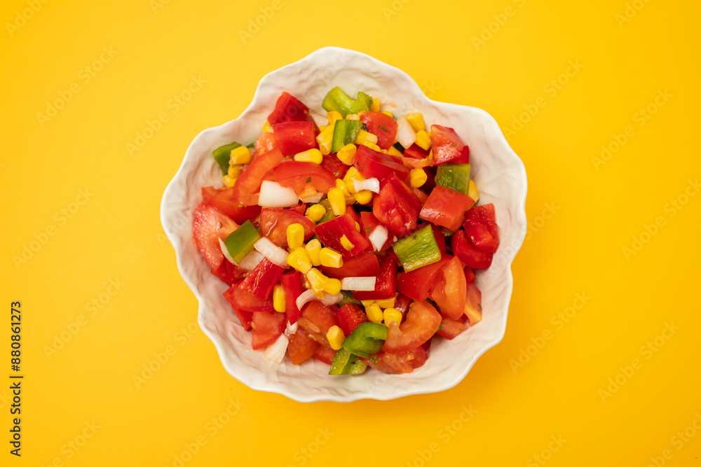 Wall mural vegetable salad in white beautiful bowl