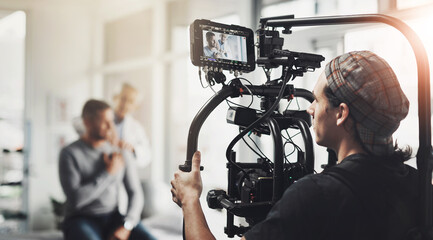Production, shooting and man with camera in recording for healthcare, commercial and creative...