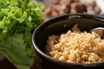 Bowl of rice, Garlic fried rice serve with vegetables.