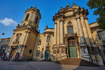 Fototapeta premium Ukraine, Lviv - August 10, 2016: panoramic view of historical old city district. Dominican Cathedral Church of the Holy Eucharist now .