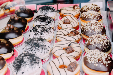 Colorful Donuts with Various Toppings On Tray