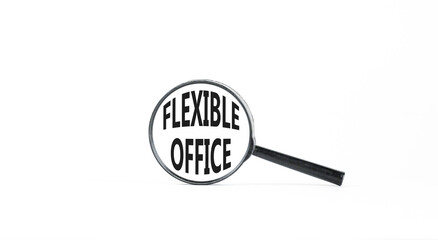 Flexible office symbol. Concept words Flexible office in beautiful magnifying glass. Beautiful white paper background. Business Flexible office concept. Copy space.