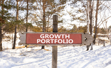 Growth portfolio symbol. Concept words Growth portfolio on beautiful wooden road sign. Beautiful winter forest snow tree background. Business Growth portfolio concept. Copy space.