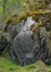 Mexican men watching huge rock in  Pico de Orizaba National Park, Mexico, rock climbing and ecotourism in Mexico, forest bathing, eco travel, calm and serenity in mexico