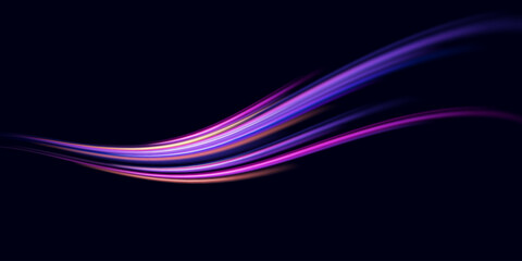 Neon color glowing lines background, high-speed light trails effect. Modern abstract high-speed light motion effect on black background. Light motion effect, slow shutter of traffic.