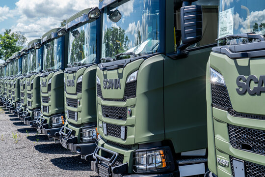 Koblenz, Germany - July 7, 2024: Scania R450 trucks await delivery to the armed forces