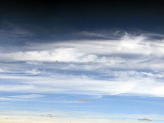 Obraz premium Fluffy White Clouds in a Blue Sky as A Skyscape Background