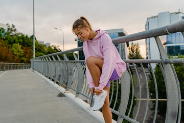 attractive young woman doing sports in the morning