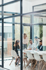Window, business people or planning in meeting for documents, teamwork or collaboration together. Shareholders, investor or executive director speaking in discussion for feedback, review or paperwork