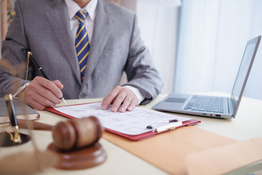 client meets with a lawyer within the legal counsel office to request advice about law and lawsuit that will be filed in order to obtain an advantageous outcome in lawsuit. legal counsel concept