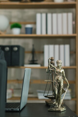 statue of god Themis Lady Justice is used as symbol of justice within law firm to demonstrate...