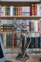 statue of god Themis Lady Justice is used as symbol of justice within law firm to demonstrate...