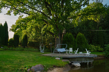 Serene Garden with Deck and Swing