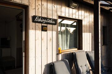 Fishing Cabin Exterior with Chairs