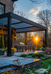 Sunset Patio With Pergola And Grill. A patio with a modern pergola and a grill