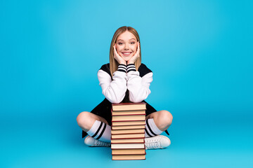 Photo of pretty lovely cheerful girl wear trendy clothes long socks isolated on blue color background