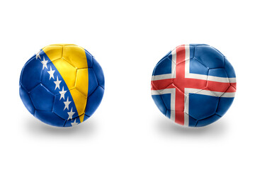 Obraz premium football balls with national flags of iceland and bosnia and herzegovina,soccer teams. on the white background.
