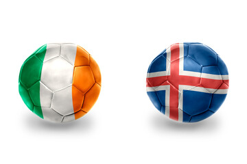 Obraz premium football balls with national flags of iceland and ireland ,soccer teams. on the white background.