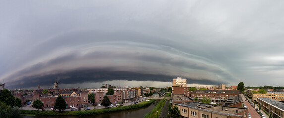 Shelf cloud over city