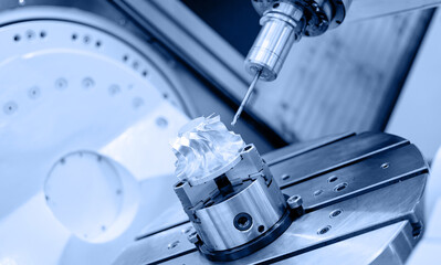 Industry CNC milling machine process cutting turbine impeller and blades, blue light toning