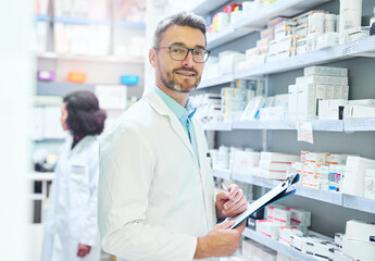 Pharmacy, smile and portrait of man with checklist for dispensary, inventory and information. Medical, professional and mature pharmacist with clipboard for count in healthcare, supply and inspection