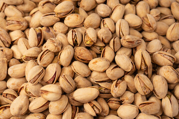 Tasty pistachios isolated on a white background.