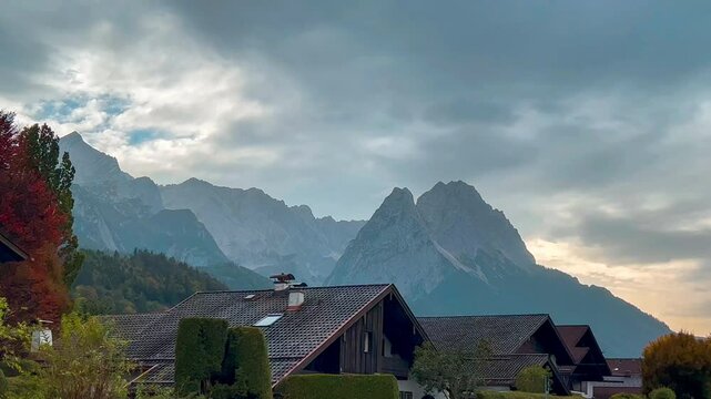 German traditional architecture half-timbered painted wooden houses in historical center Wallgau, Upper Bavaria, Germany, October 10, 2023. High quality 4k footage