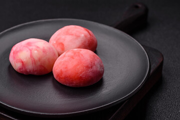 Delicious colorful asian mochi sweets with rice dough shell