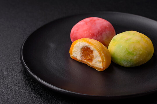 Delicious colorful asian mochi sweets with rice dough shell - Powered by Adobe