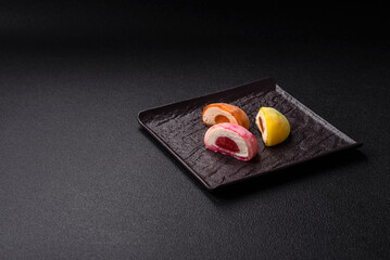 Delicious colorful asian mochi sweets with rice dough shell