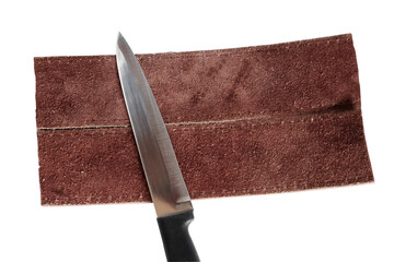 Knife sharpening leather strop for finishing .