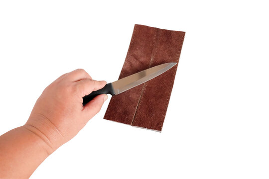 Knife sharpening leather strop for finishing .
