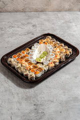 sushi is a Japanese dish of prepared vinegared rice, usually with some sugar and salt, accompanied by a variety of ingredients such as seafood, often raw and vegetables.