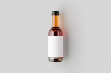 Fototapeta premium Small rose wine bottle mockup. Bordeaux shape.