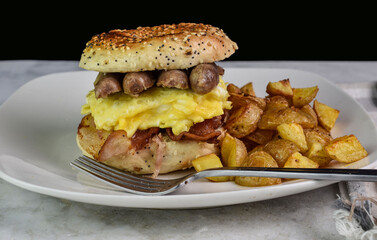 scramble egg ,bacon and sausage breakfast sandwich