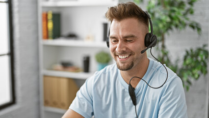 Hispanic man with beard wearing headset smiling indoors