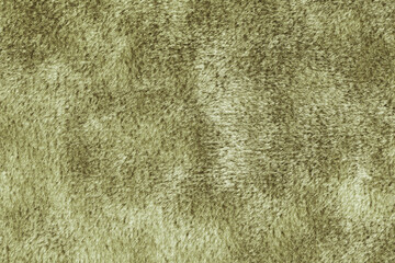 Faux fur texture, fluffy velours khaki fabric or cloth, upholstery textile