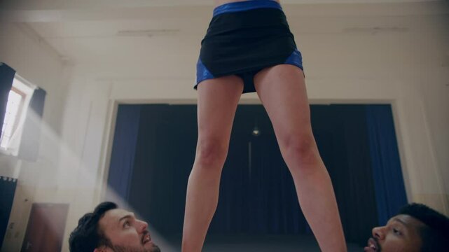 Woman cheerleader practicing her role