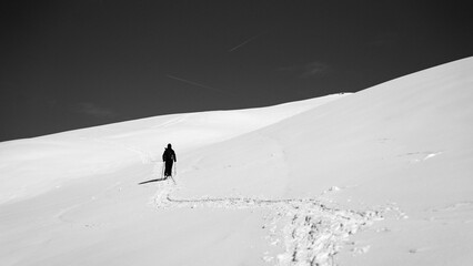 black and white hiker in the mountains