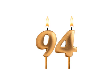 Golden candle number 94 - Birthday on white background