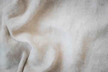 Abstract linen fabric texture background. Natural white linen fabric background with draperies. Top...