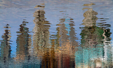 Buenos Aires city reflected on river.