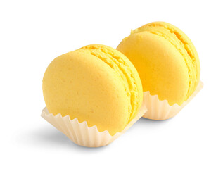 Sweet yellow macaroons on white background