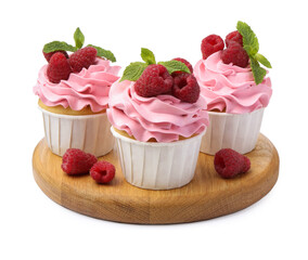 Tasty cupcakes with raspberries and mint isolated on white